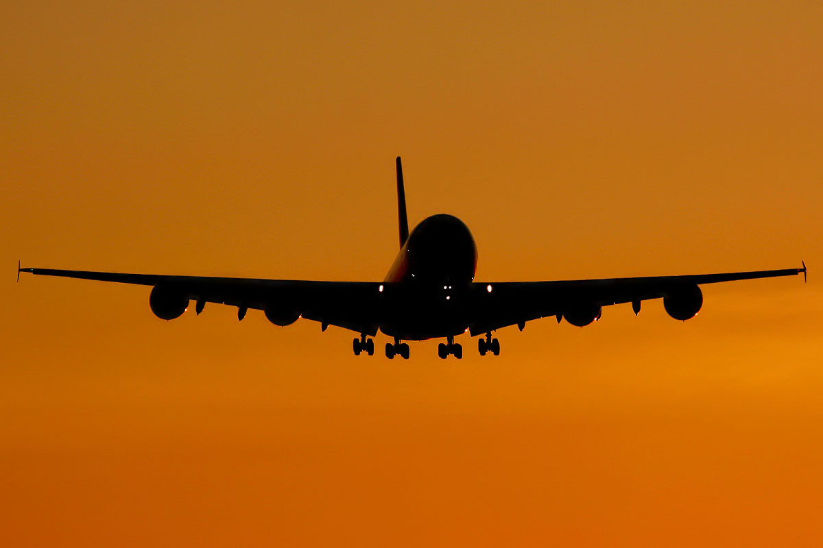 9V-SKD (cn 008) Landing on runway 09L just after sunset at London Heathrow. The distinctive silhouette of the Airbus A380